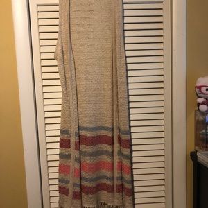 Long sleeveless vest